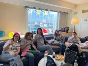 Group of women at a bachelorette party enjoying IV drip therapy for hangover relief.
