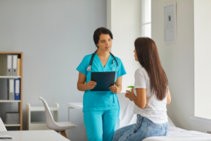 Healthcare provider consulting with a patient for personalized IV therapy.