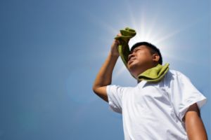 Man experiencing dehydration under the sun.