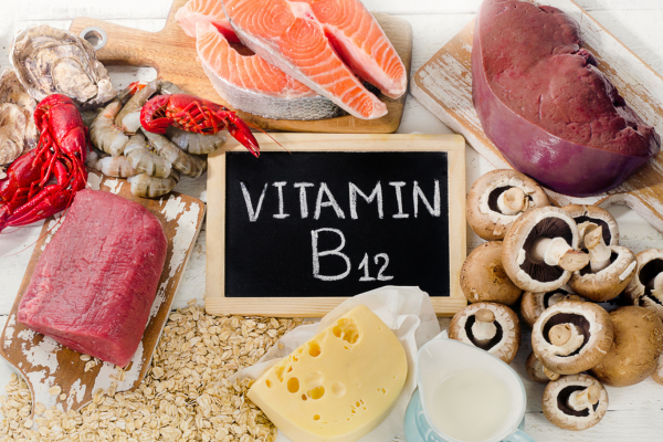 A variety of foods high in Vitamin B12, including fish, meat, and cheese, which are natural sources of this essential vitamin.