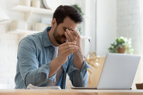 Man suffering from the feeling of fatigue.